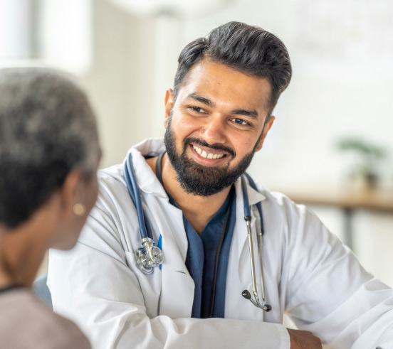 Aya Locums physician talking to colleague